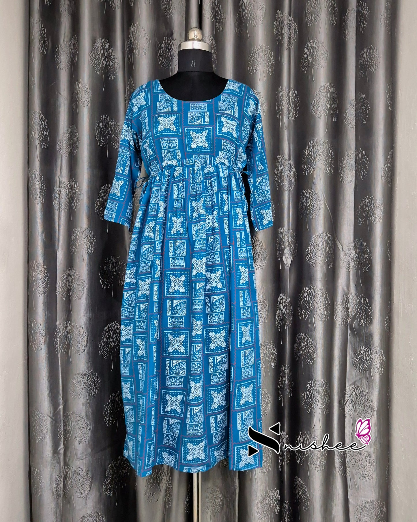 Square Blue designed dress with adjustible side knot