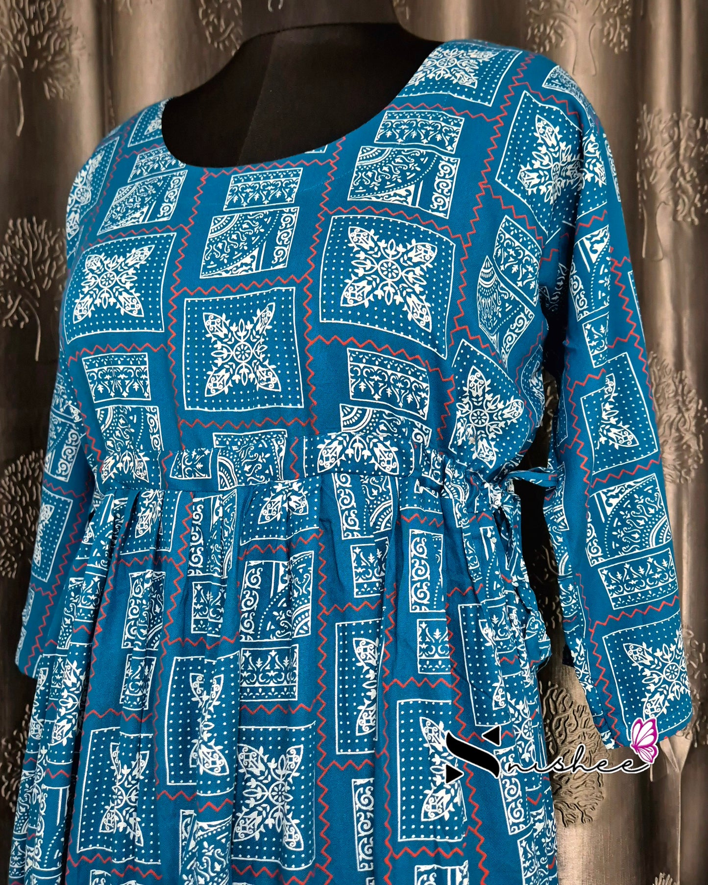 Square Blue designed dress with adjustible side knot